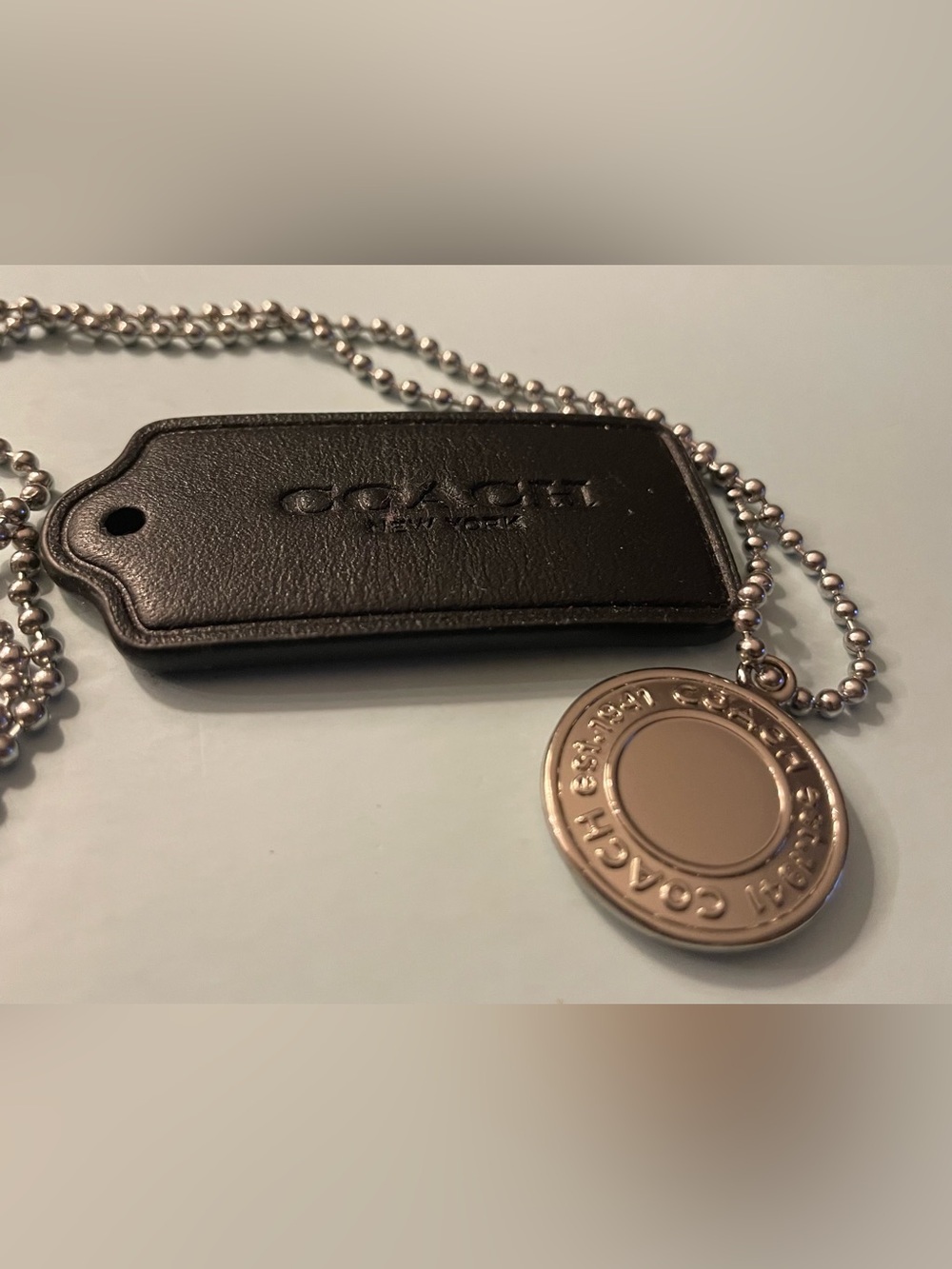 COACH Black Leather Tag Necklace with Silver-tone Medallion